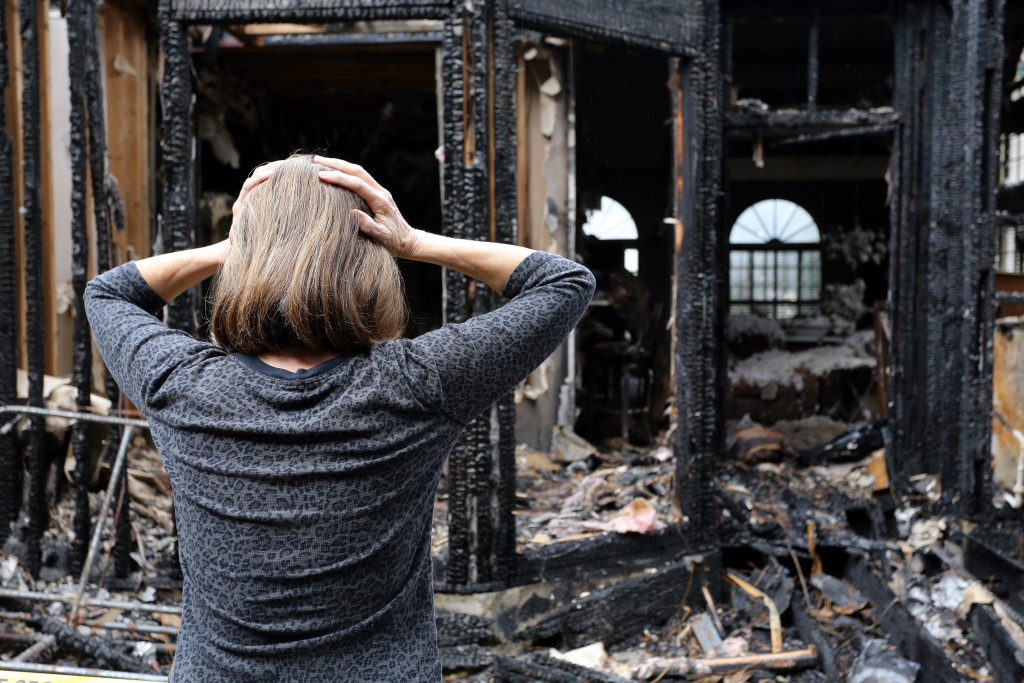 House fire damage and owner